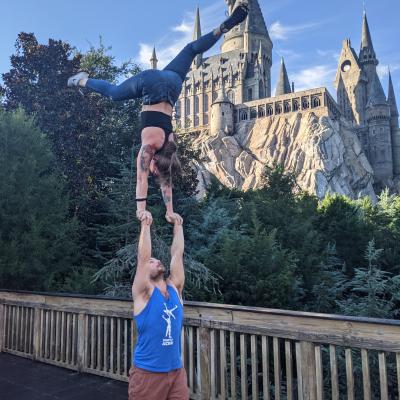 Ben basing hand to hand in front of Hogwarts Castle