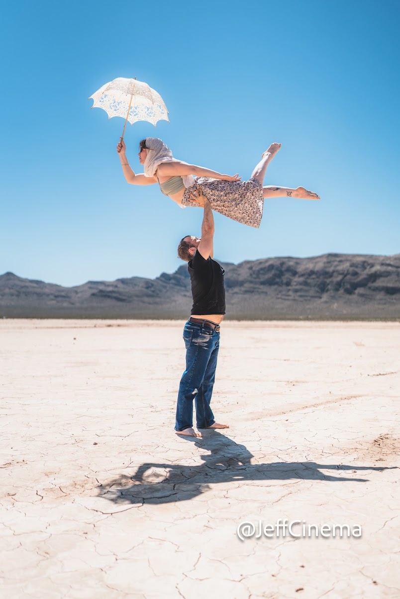 Cass flying hand to hand in an old building